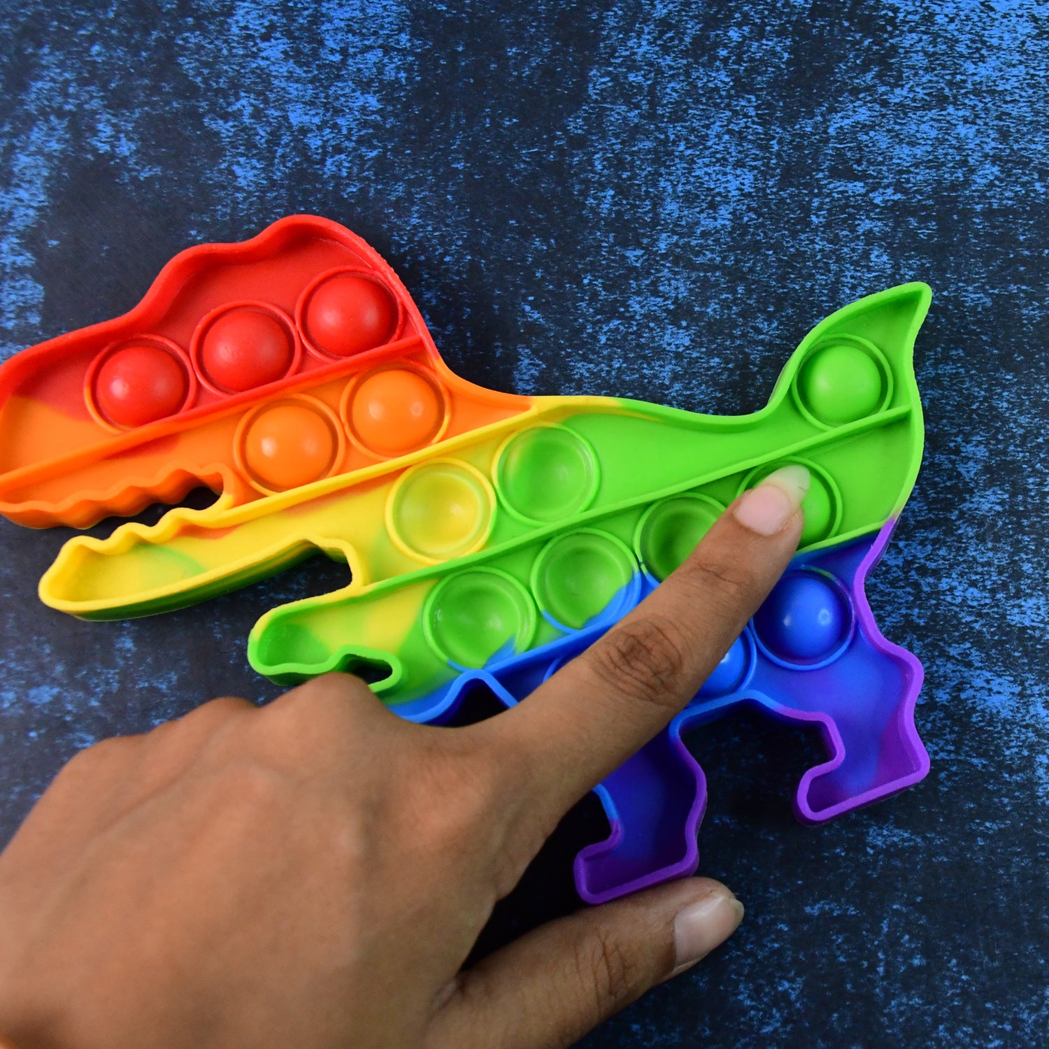 Dinosaur Shaped Rainbow Pop It Fidget Toy (1 Pc) Dinosaur Shaped Rainbow Pop It Fidget Toy (1 Pc)